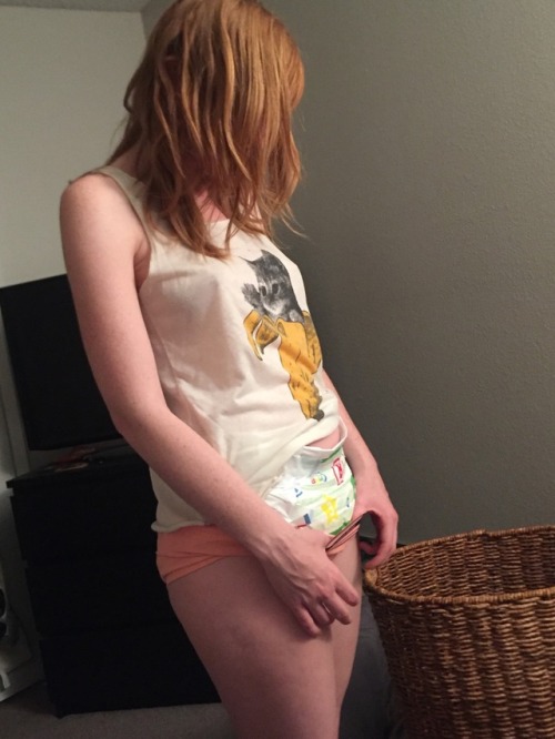 babytabbycat:Playing with my diaper and daddy before getting ready for bed:)