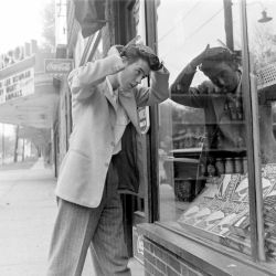 wehadfacesthen:  Teen boy fixing his hair in Des Moines, Iowa,