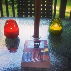 Bug lights, perfect weather, and a new book. #summer #perfection