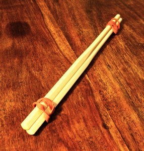 dare-master:  Chopstick Nipple Clamps Materials Required 2 pairs of chop sticks. Avoid wooden ones you snap apart to avoid splinters. 4 Elastic/rubber bands. Take one pair of chopsticks and hold them together. Wrap one elastic band around two of the ends,