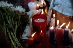 yehudiah:  Some of the many candles at the public memorial for