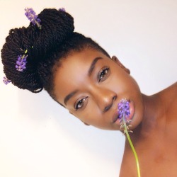 youngnubian:  Melanin, check. Flowers in hair, check. Natural/Protective