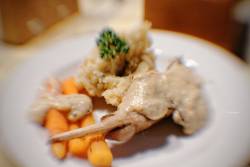 Braised rabbit in mushroom sauce with mashed potatoes and baby