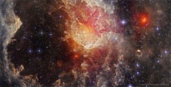 just–space:  Stars and Dust Pillars in NGC 7822 from WISE.