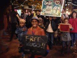 rikkisixx:  This image, shot by freelance photographerÂ Johnny Nguyen, shows Portland Police Sgt. Bret Barnum hugging 12-year-old Devonte Hart during theÂ Ferguson demonstrationÂ in Portland on Nov. 25, 2014. According to Sgt. Barnum, the interaction