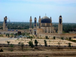 Umm al-Qura mosque in April 2004, showing three of the four perimeter
