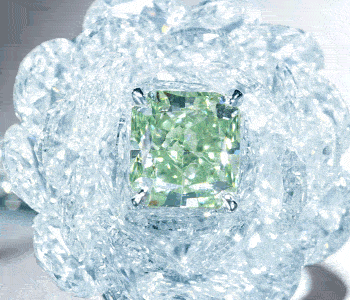 tiffanyandco:  A rare green diamond emerges from tiered white