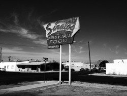 klappersacks:  Vacant lot with an old timey sign in Bakersfield