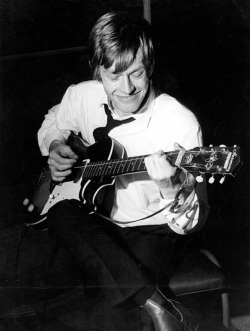 goo-goo-gjoob-goo-goo:  Brian Jones playing guitar, circa 1965.