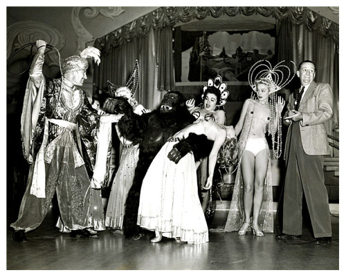 Vintage 1942 “File Copy” photo from the estate of famed photographer Joseph Jasgur.. Featured onstage at the FLORENTINE Gardens nightclub, are: (at Far Right) Burlesque impresario and emcee: Nils Thor Granlund.. Along with “Emil the