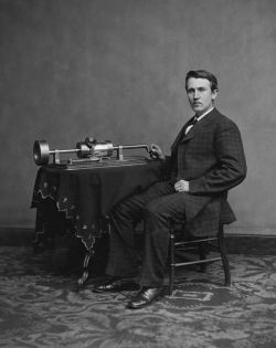 Photograph of Edison with his phonograph (2nd model), taken in