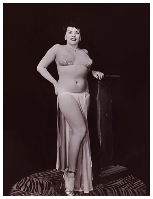 Suzette      aka. “The French Doll”..A publicity still promoting the 1953 burlesque film: “PEEK A BOO”; a documentary-style recording of a complete Burlesk show; as filmed at the ‘FOLLIES Theatre’, in Los Angeles..