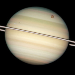 just–space:  Quadruple Saturn moon transit snapped by Hubble