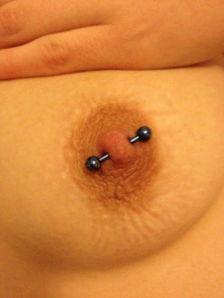 feisty-little-red:  Here’s one of my nipple piercings ^~^