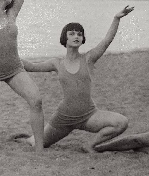16-year-old Louise Brooks posing on a beach with members of the