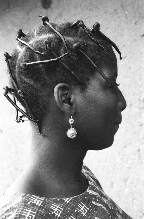 lokoja:Yoruba woman with hair wrapped in black thread in Ife,