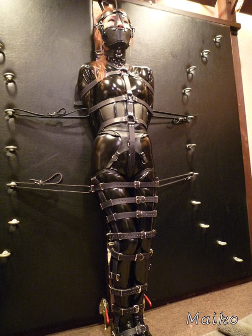 Japanese leather and rubber bondage. Great series of images