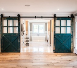 stylish-homes:  100-year-old carriage doors open onto the master