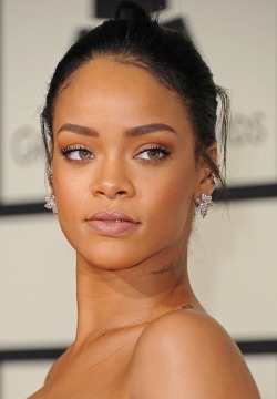 ikonicgif: Rihanna arrives on the red carpet for the 57th Annual