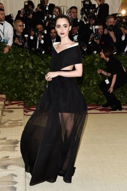 aishwaryaraii:Lily Collins joins the dark side at Met Gala 2018