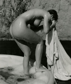 flashofgod:  André de Dienes, Model getting out of the bath,