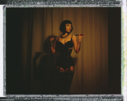 therese-rosier:  Polaroid photoset by Murhaaya.comCorset and