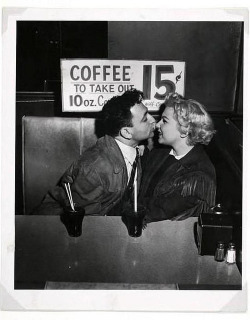 coufuckyeahvintage-retro:  Man and woman kissing at drug store,