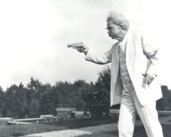 sexhaver: peashooter85: Mark Twain with his Colt Model 1903 pistol,