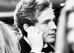  Sam Claflin talking to fans @ BAFTAs 2014 (x) 