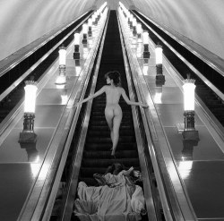 sir-j:  A woman is captured climbing the escalator on the Moscow