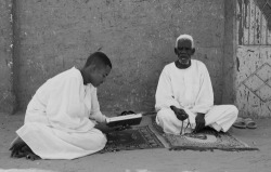 whitegurlll: Young man reading the Quraan for his father | Sudan