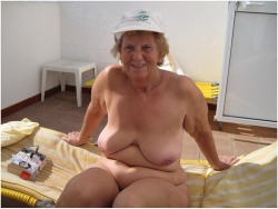 Another shot of our nude beach granny trolling for young studs.