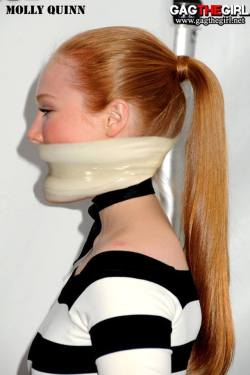 Super tight tape gag! Bondage and fetish images @  Art of Bondage