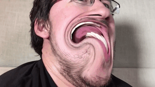 working-on-a-username:  Oh no, someone let Mark play with Photobooth again [X]