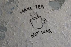 dazykid:  “Make tea not war” An anti-war slogan that