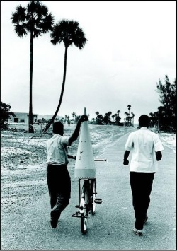 Part of India’s first rocket being transported on a bicycle