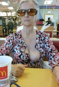 mr-reblogger-:  Granny shows boob to get discount..she forgot