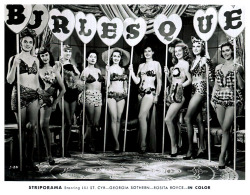 A bevy of showgirls pose for a lobby card used to promote the