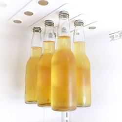 dailycoolgadgets:  Magnetic Bottle HangerMost people find it