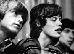 sirpeter64:  Brian Jones and Mick Jagger. Bill in soft focus.