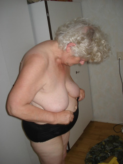 This granny has flabby hanging boobs, but then again, some guys