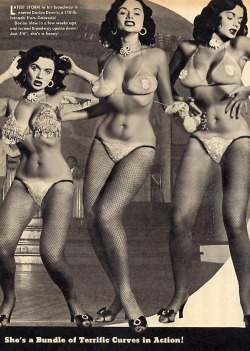  She&rsquo;s a Bundle of Terrific Curves in Action! Dorian Dennis appears in the pages of an unidentified 50&rsquo;s-era Men&rsquo;s Mag.. 