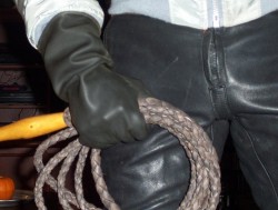 boothound2013:  Leather pants, rubber glove & bullwhip