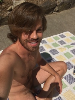 dontneedclothes:  This is my first post!   I took it today while reading and getting some sun on my driveway. The temp was in the 60’s but it felt hot on the concrete. It’s not easy for anyone on the road to see me, so I don’t worry about offending