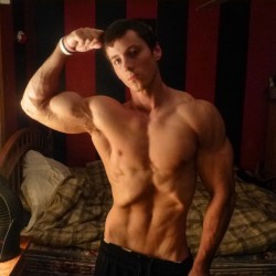 beautifulyoungmuscle:The stunning flexed biceps of Zach Zeiler.