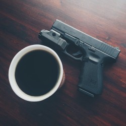 primerprojects:  Starting the day off right: coffee black, gun