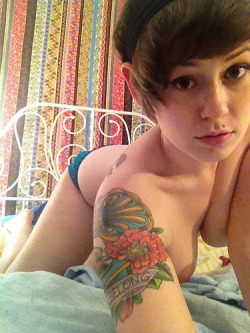 pixiedreamgirl from mygirlfund posing topless on her bed in this