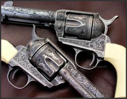 twippyfan:  Lovely set of Reigel engraved Colt SAA. Reigel engraving.com
