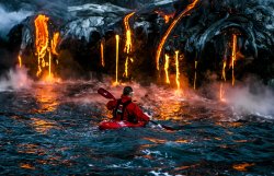 natgeotravel:  Would you dare? A kayaker paddles carefully near