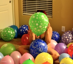 She looked so cute playing in her balloons.